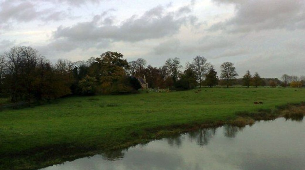 View fromTyringham Bridge St. Peter's church seen across meadows from Tyringham Bridge over the River Ouse.