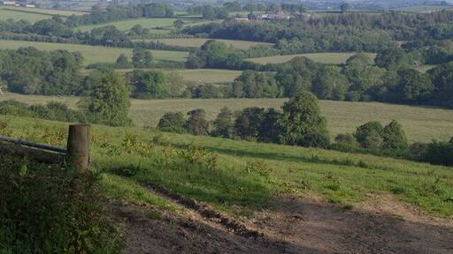 Thrushel valley near Hayne A view from the lane between Stowford and Hayne. The Thrushel's course follows the second line of trees, and left of centre of the photo it is running close to the northern edge of the square. The farm in the distance, beyond North Plantation, is East Rowden in SX4187.