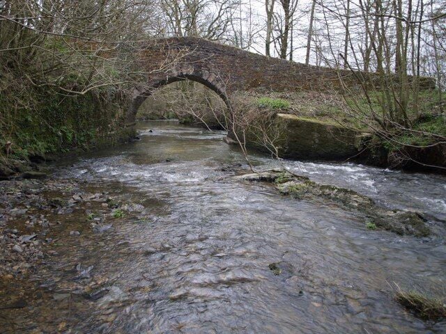Stowford Bridge The River Thrushel heads under the bridge carrying the Two Castles Trail.