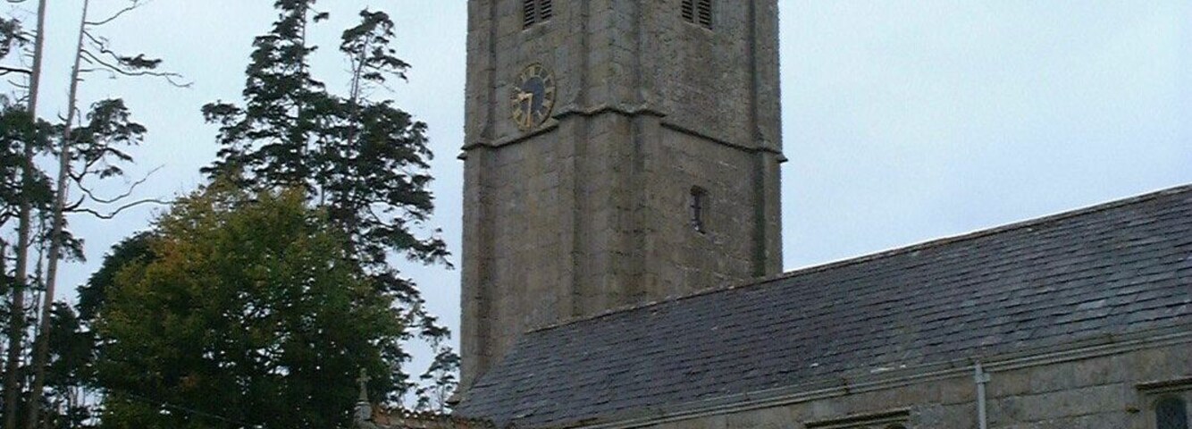 West tower and south porch of St Mary the Blesséd Virgin parish church, Exbourne, Devon, seen from the southeast