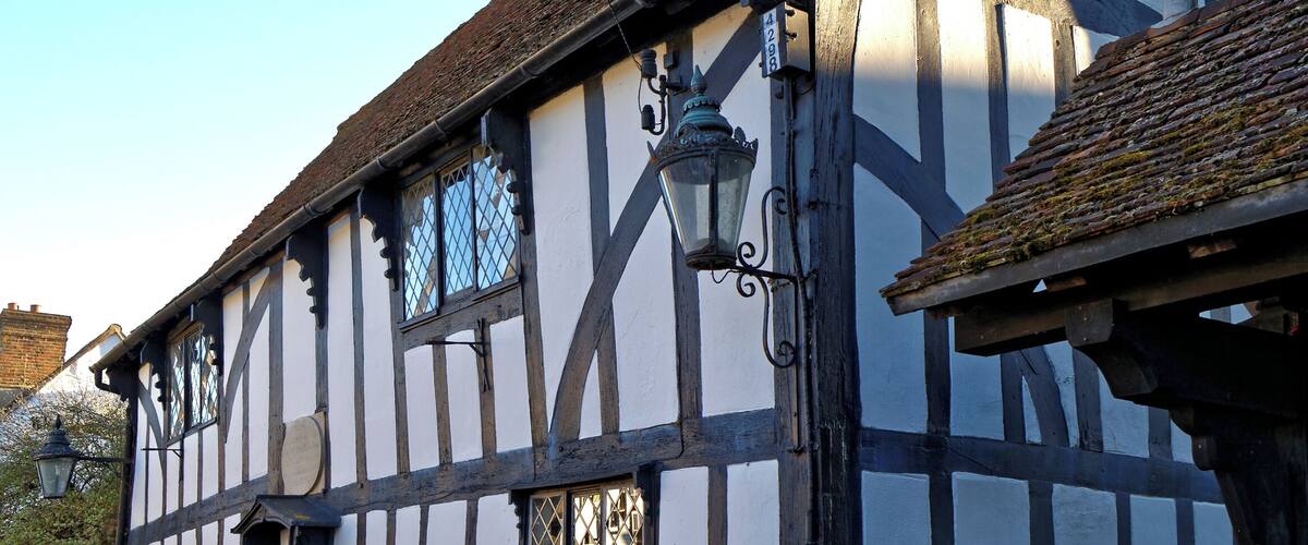 A Grade II listed c.1600 timber framed private residence, previously the Stafford almshouses for two poor widows of the parish, and before that the schoolmaster's house for Churchgate School, in Churchgate Street, Harlow, Essex, England. Churchgate Street is an ancient village, which was in the old parish of Harlow, in Essex England. It lies within, and at the northwest of, today's town of Harlow, and conjoined to an area known as Old Harlow. Camera: Canon EOS 6D with Canon EF 24-105mm F4L IS USM lens. Software: large RAW file lens-corrected, optimized and downsized with DxO OpticsPro 11 Elite, Viewpoint 2, and Adobe Photoshop CS2.
