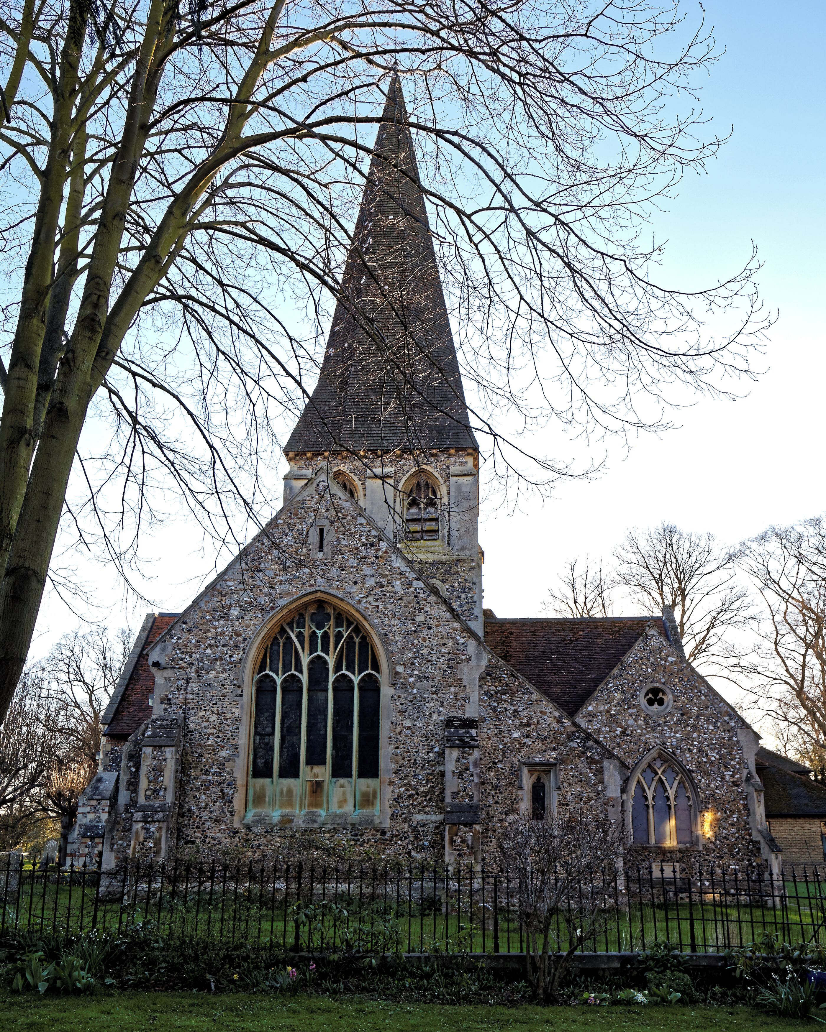 The Grade II listed parish Church of St Mary and St Hugh, from the east and the main street of Churchgate Street, Harlow, Essex, England. Churchgate Street is an ancient village, which was in the old parish of Harlow, in Essex England. It lies within, and at the northwest of, today's town of Harlow, and conjoined to an area known as Old Harlow. Camera: Canon EOS 6D with Canon EF 24-105mm F4L IS USM lens. Software: large RAW file lens-corrected, optimized and downsized with DxO OpticsPro 11 Elite, Viewpoint 2, and Adobe Photoshop CS2.