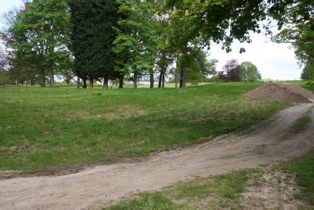 Ottershaw. West side of the square, off the A317, looking north towards The Coach House, with Queenwood Golf Course between.