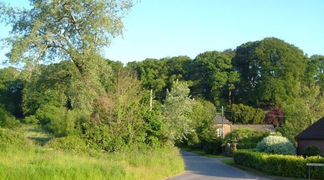 Venn Ottery. The lane junction at the tiny village, now considerable enlarged by new houses in Barton Mews (right). The lane ahead leads to Newton Poppleford.