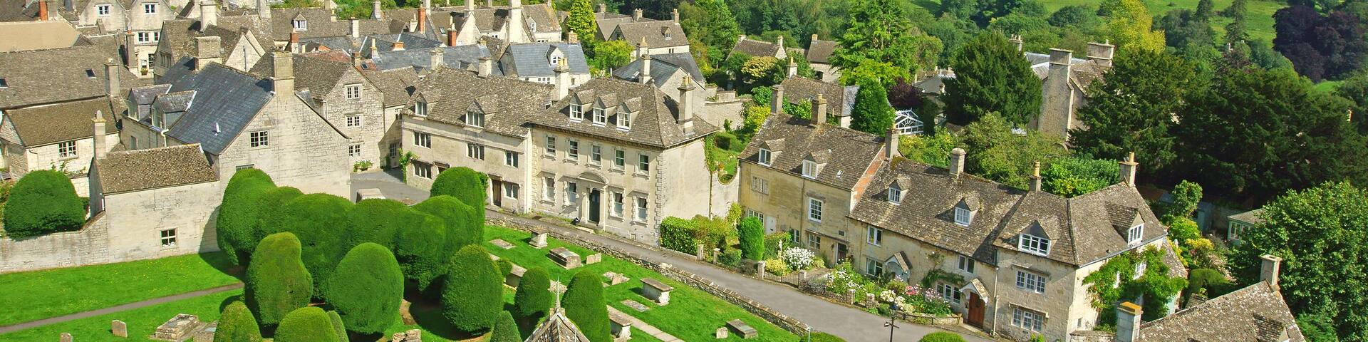 The view from St Marys church tower looking over the village of Painswick and the Cotswold escarpment towards Sheepscombe, The Cotswolds, Gloucestershire, United Kingdom