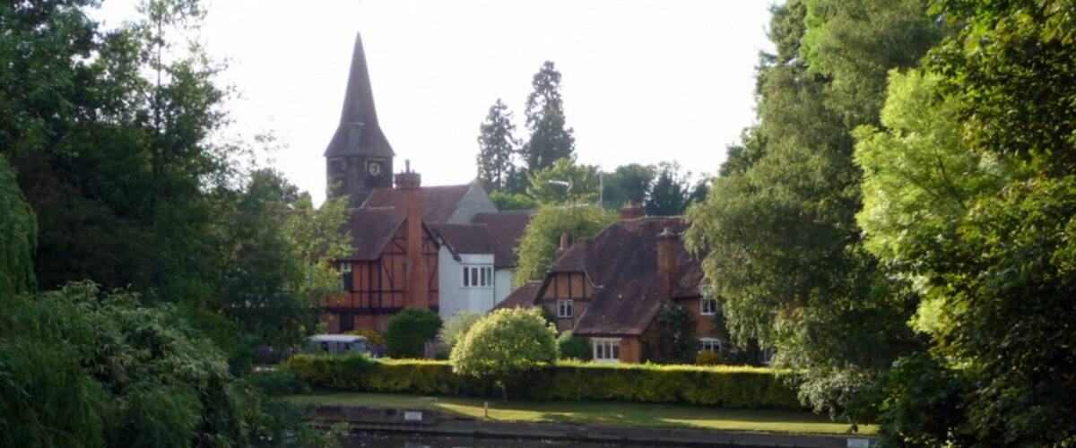 Whitchurch-on-Thames from the toll bridge The spire of St Mary's Church can be seen in the distance.