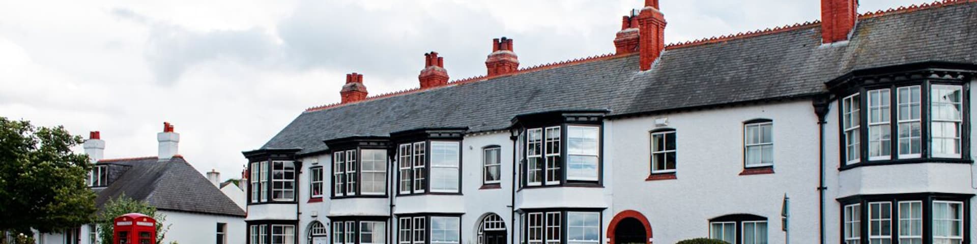 Suburban terrace with red phone box
