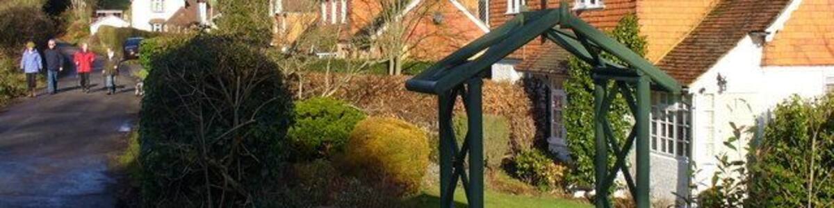 Pond Lane Tile-hung cottages line the quiet road heading north from Peaslake's Hurtwood Inn.