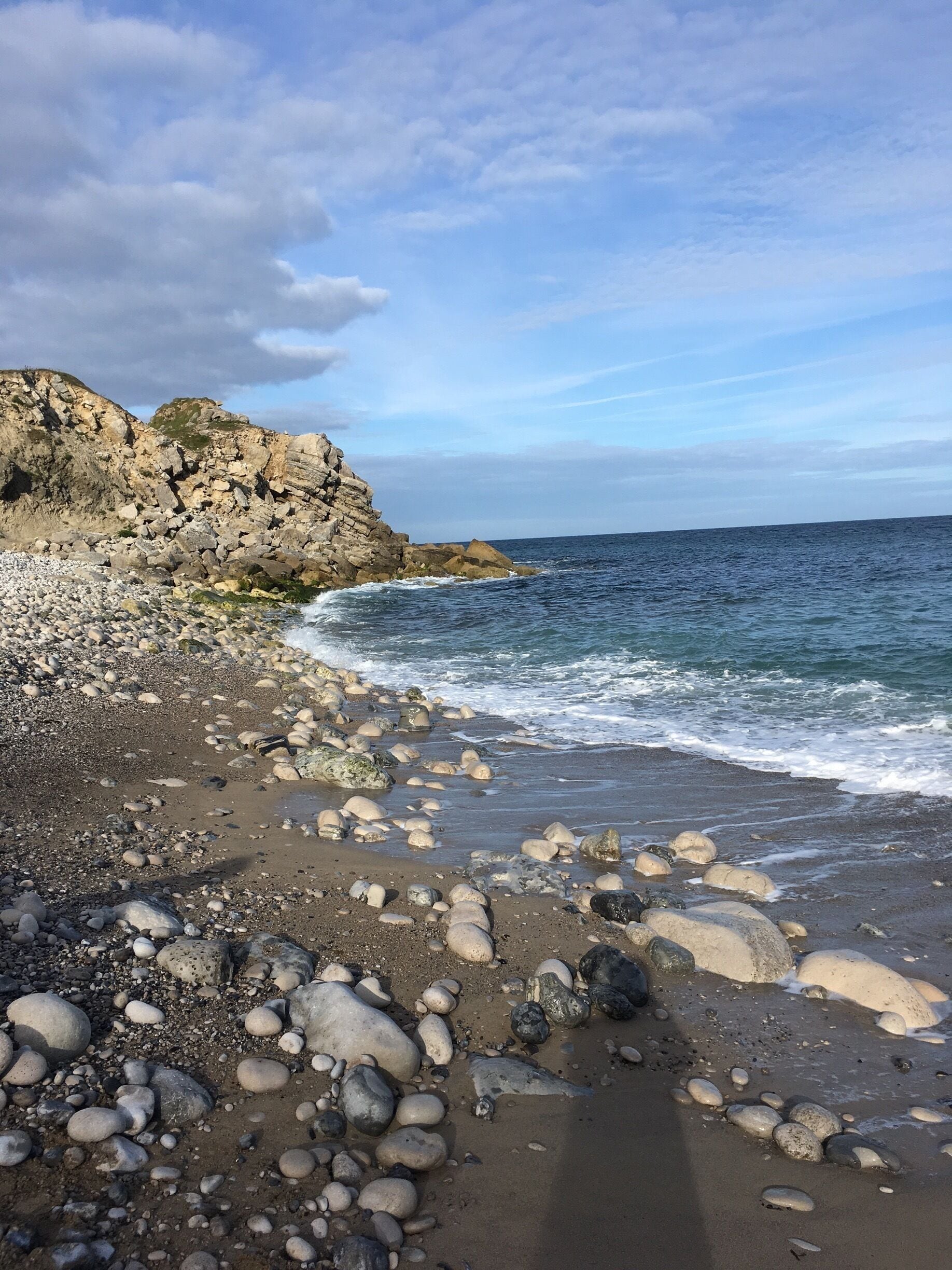 Beautiful quiet beach 
Very big pebbles, rocks so probably don't attempt to go barefoot.