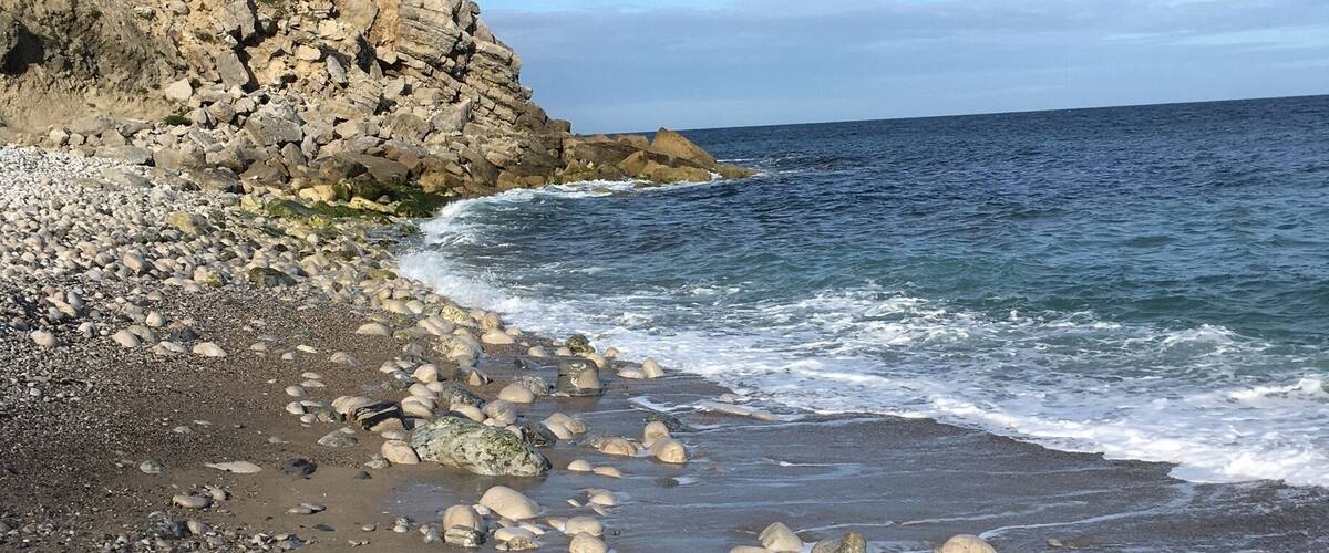 Beautiful quiet beach 
Very big pebbles, rocks so probably don't attempt to go barefoot.