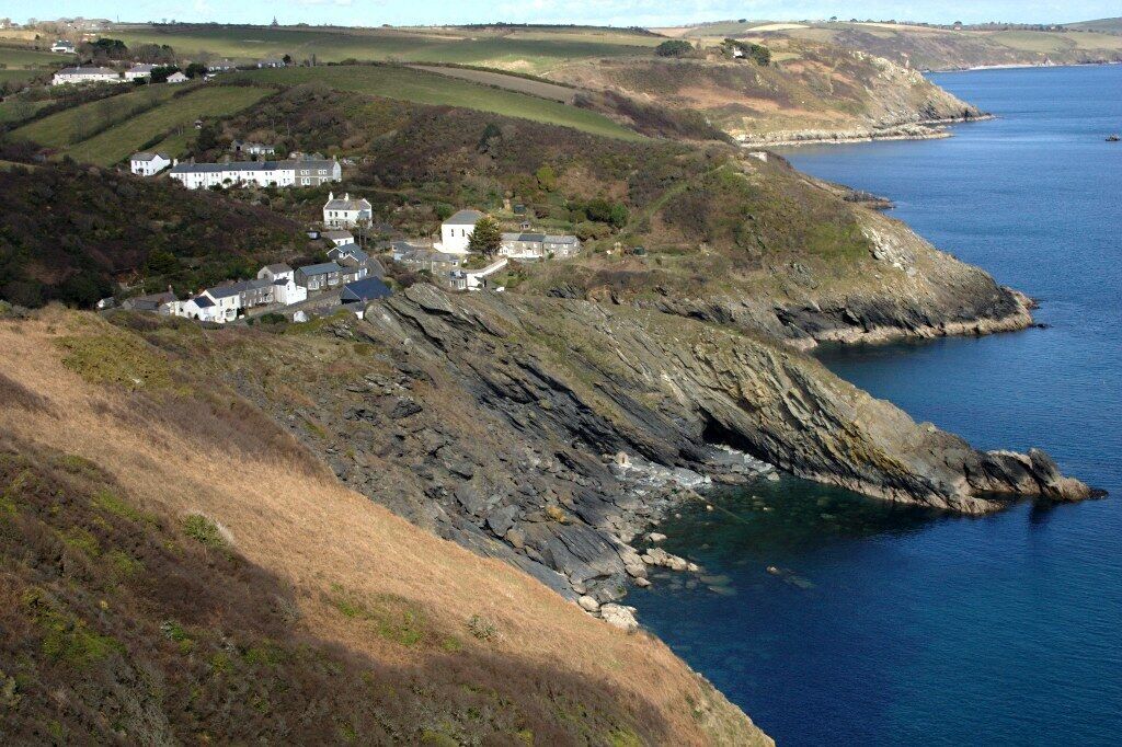 Portloe Coastline Looking down on the old fishing village of Portloe from the coast path to the south west of the village.