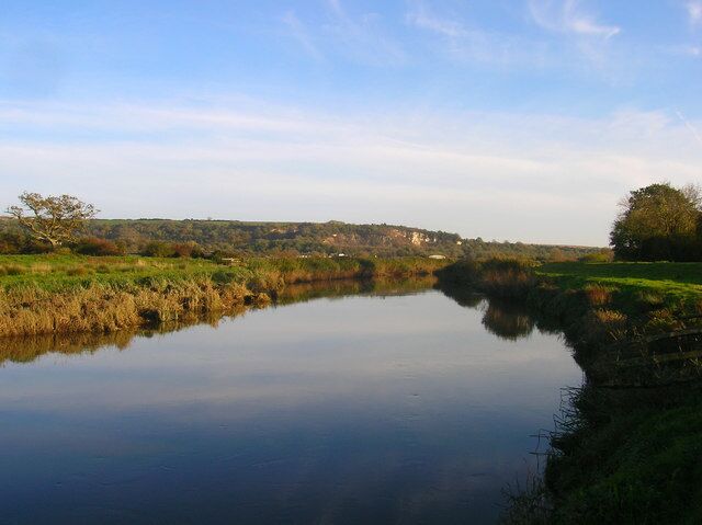River Arun Looking downstream with the chalk pits of Amberley in the distance.