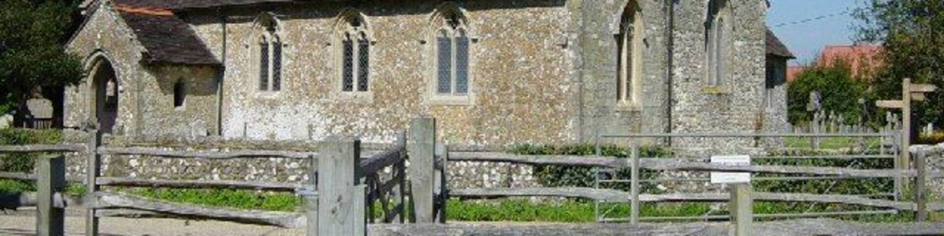 SS Peter and Paul parish church, Ashington, West Sussex, seen from the southeast. The nave is 15th-century; the south aisle was added in 1872. One of the bells was cast in 1350.