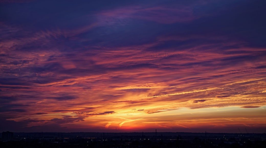 Dawn clouds in April 2016 over northeast London, England. Camera: Canon EOS 6D with Canon EF 24-105mm F4L IS USM lens. Software: RAW file lens-corrected, optimized and converted to Jpeg with DxO OpticsPro 10 Elite and Viewpoint 2, and further optimized with Adobe Photoshop CS2.