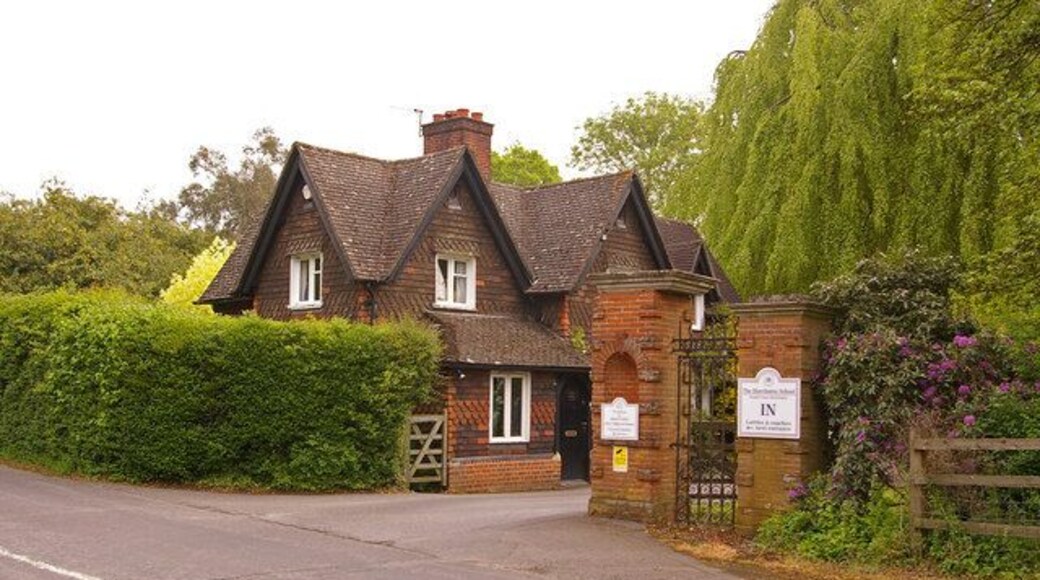 South Lodge, Pendell Court. One of two former lodges of Pendell Court (see 1564414)