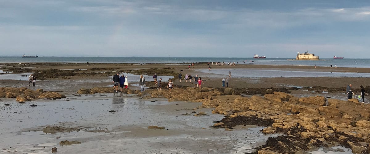 St Helens Fort Walk, St Helens, Isle of Wight. Once a year in around August, the tide is low enough for a couple of hours to enable walkers to walk out to the fort. This is viewed from the beach out to the fort.