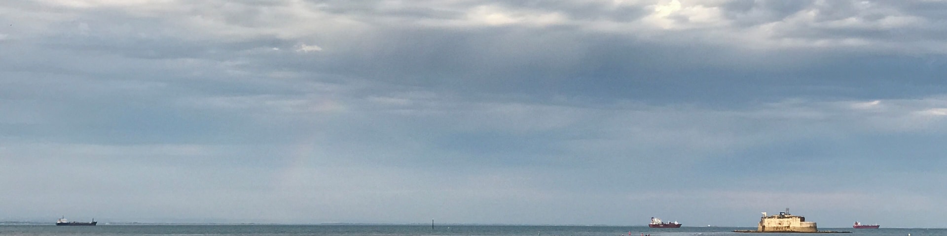 St Helens Fort Walk, St Helens, Isle of Wight. Once a year in around August, the tide is low enough for a couple of hours to enable walkers to walk out to the fort. This is viewed from the beach out to the fort.