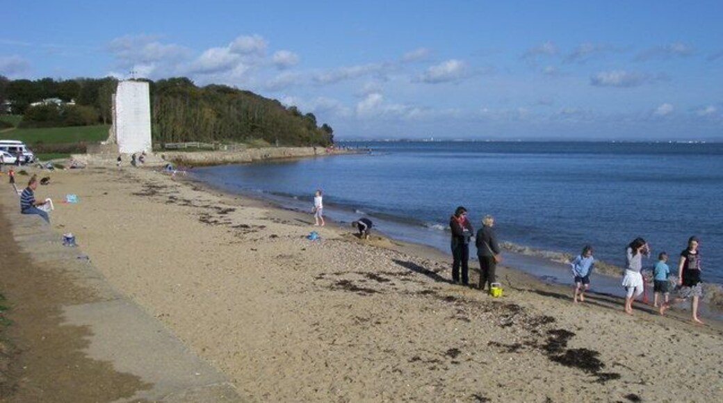 The beach at St Helen's, Isle of Wight. The white shape in the distance is what remains of the tower of old St Helen's church.