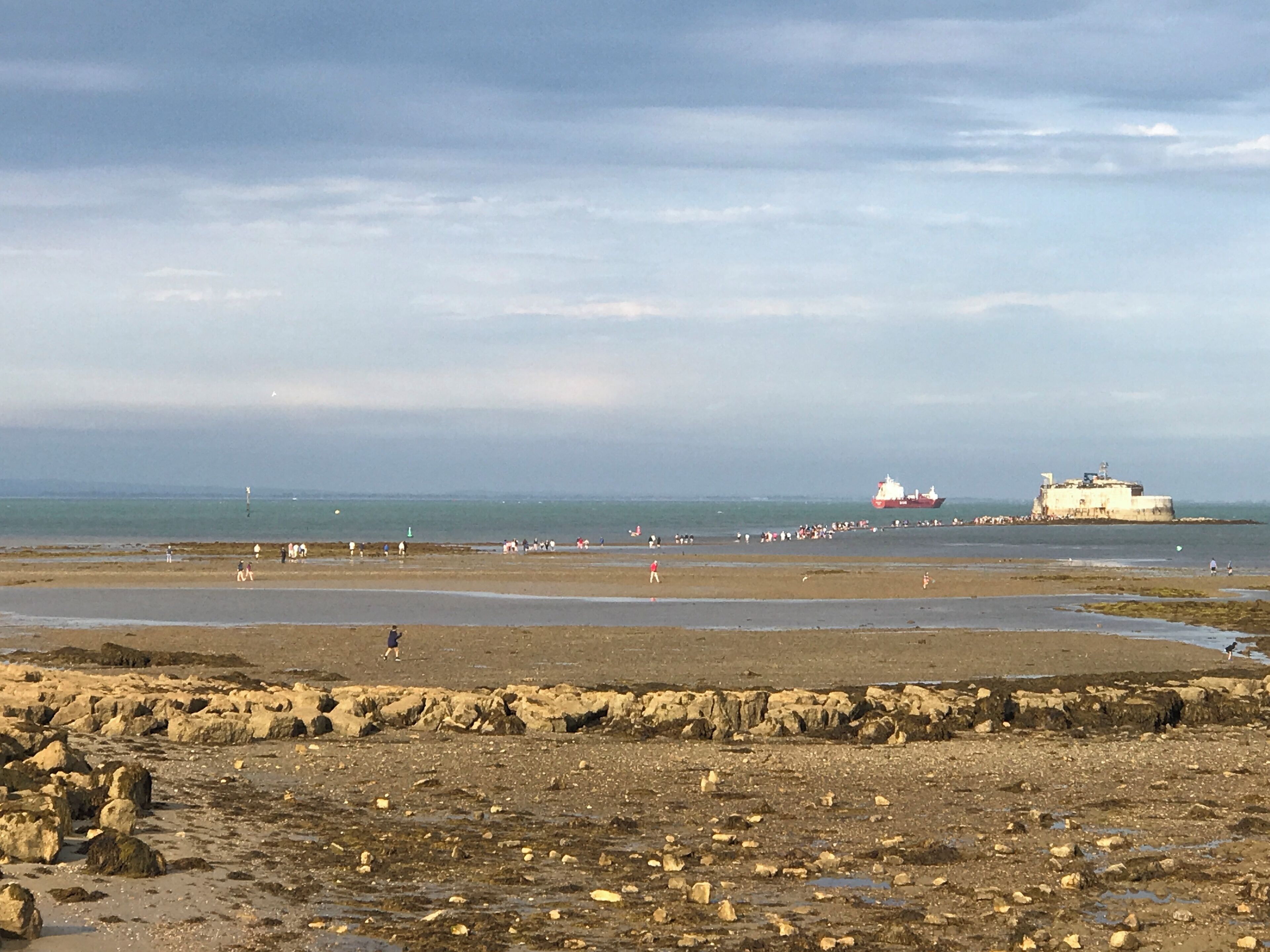 St Helens Fort Walk, St Helens, Isle of Wight. Once a year in around August, the tide is low enough for a couple of hours to enable walkers to walk out to the fort. This is viewed from the beach out to the fort.