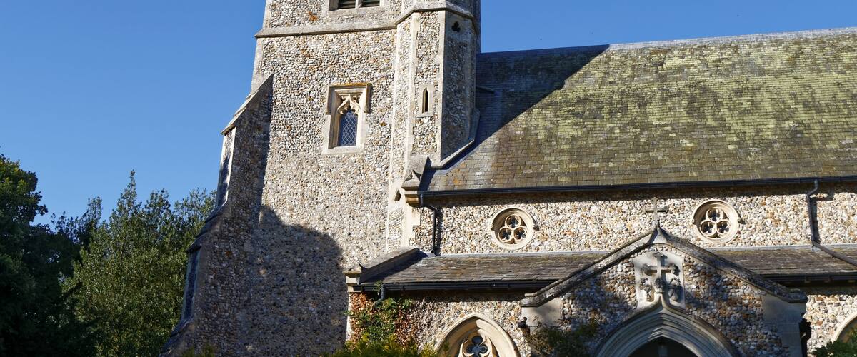 The tower and south porch of the Church of St Mary in Arkesden, Essex, England. Software: RAW file lens-corrected, optimized and converted to JPEG with DxO OpticsPro 10 Elite, and likely further optimized and/or cropped and/or spun with Adobe Photoshop CS2.