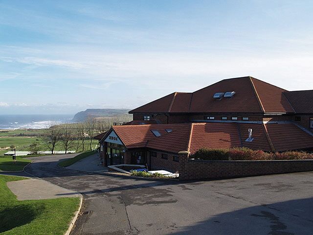 Clubhouse at Hunley Hill Golf Club Clubhouse and hotel complex, with views to Hummersea Cliff at Skinningrove