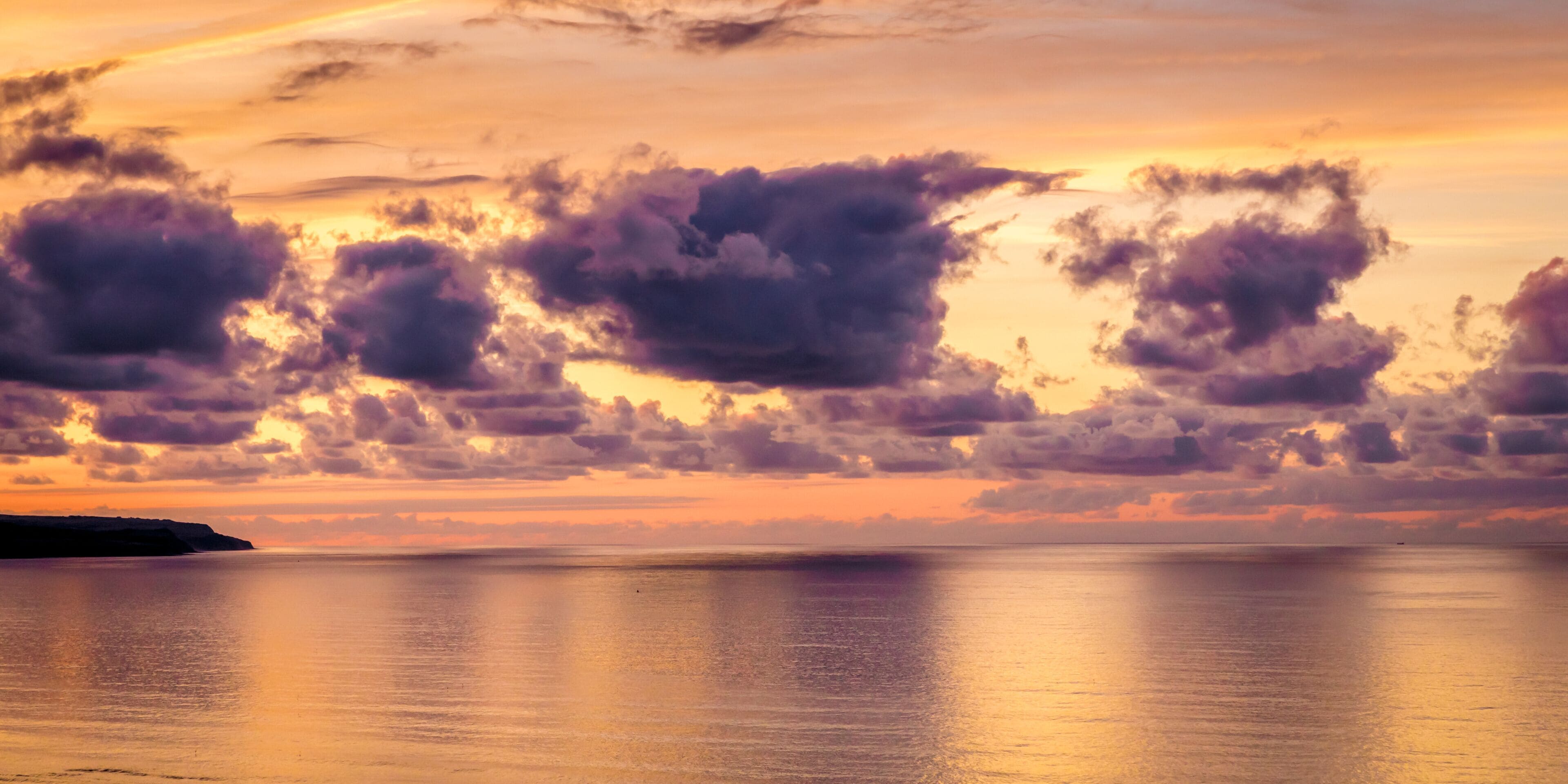 Sunset overlooking the North Sea, in Filey, North Yorkshire, England
