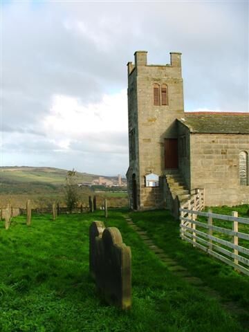 St. Nicholas' Church, Roxby. In the distance can be seen the potash mine at Boultby.