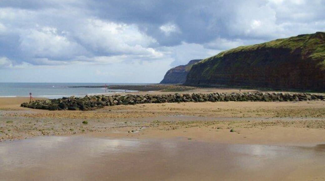 Rock Barrier at mouth of Kilton Beck Looking across the mouth of Kilton Beck to the rock barrier which helps protect the slipway and village houses at Skinningrove.