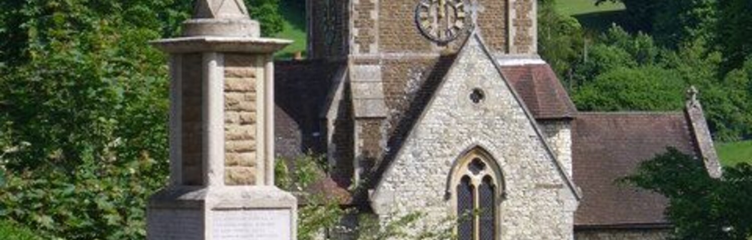 Seale War Memorial The memorial sits on Elstead Road. St Lawrence Church is in the background.