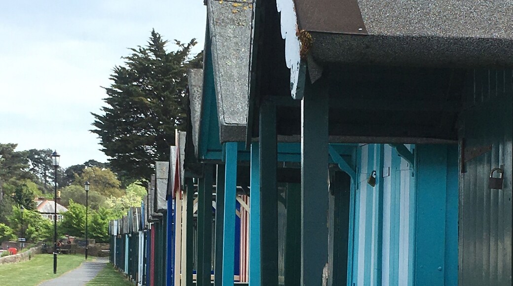 Line of beach huts overlooking The Solent