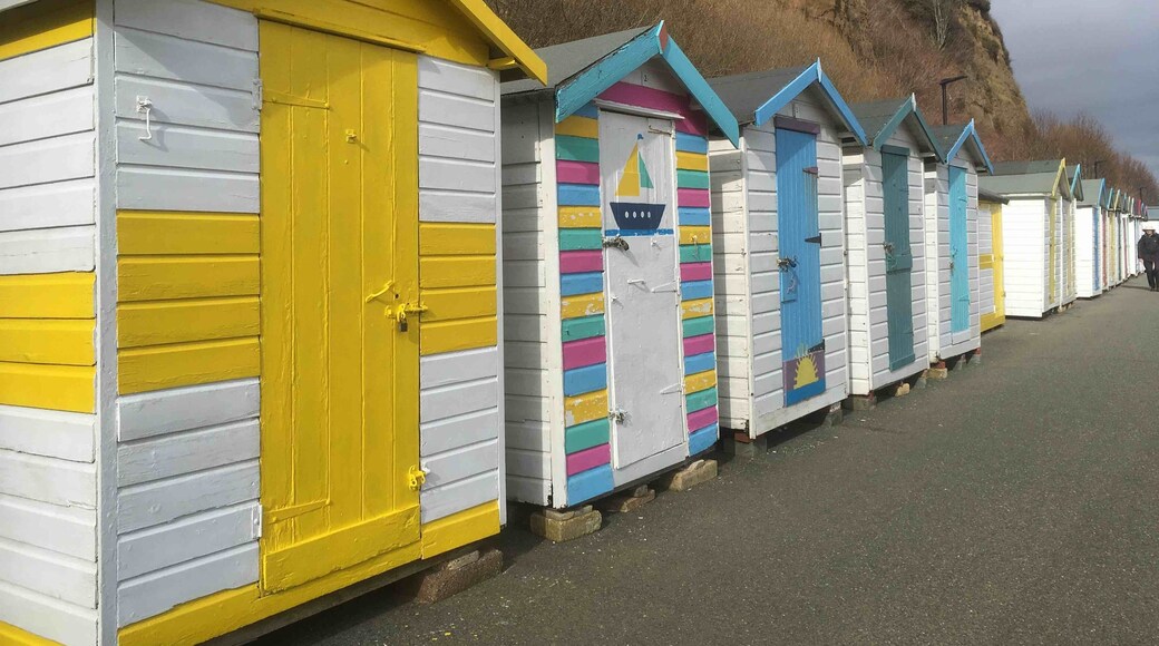 Stunning little sheltered beach with colourful huts ☀️