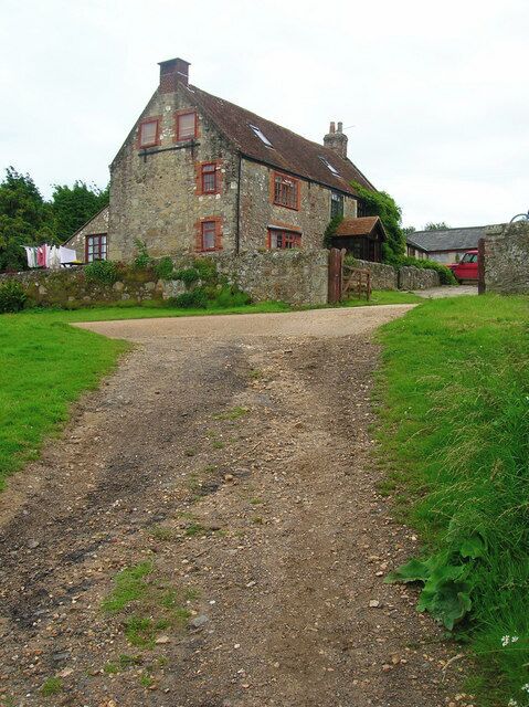 Ninham Farm Farmhouse nestling amongst a number of holiday parks and camping sites. The bridleway to America Wood goes to the right whilst the lane to Shanklin heads left.