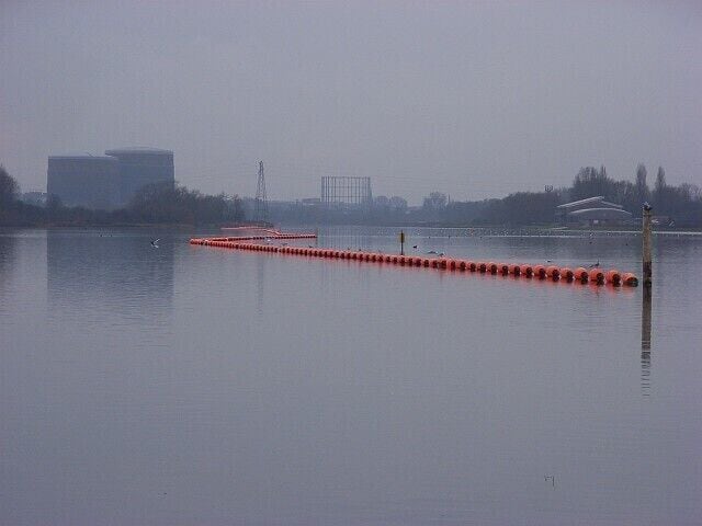 Former gravel pit, Sonning. The orange buoys give colour to an otherwise grey scene - the same view as 552076.