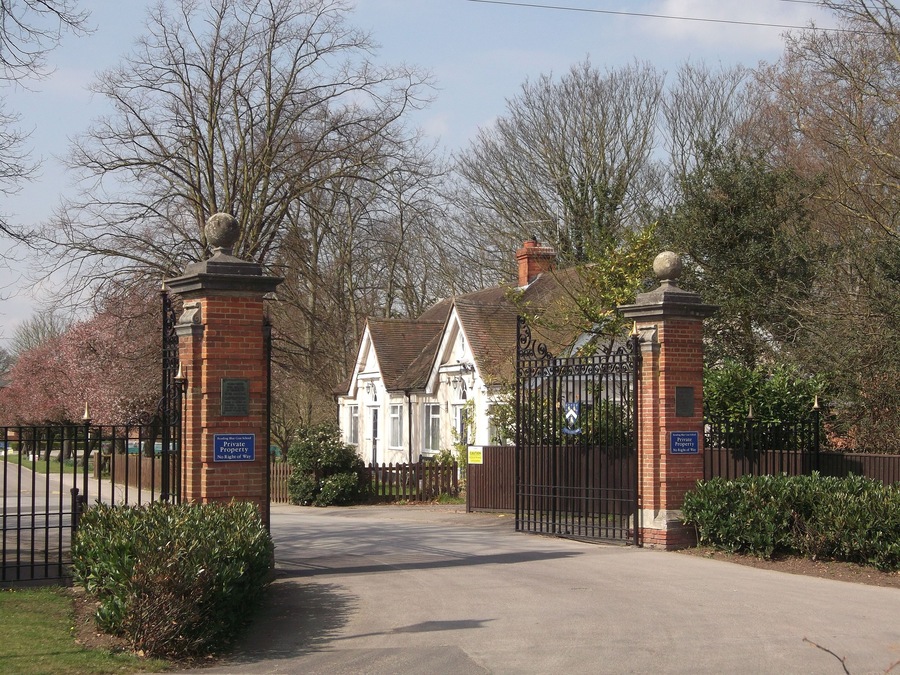 Entrance to Reading Blue Coat School. As seen from Sonning Lane. Beyond the gates is a small lodge.