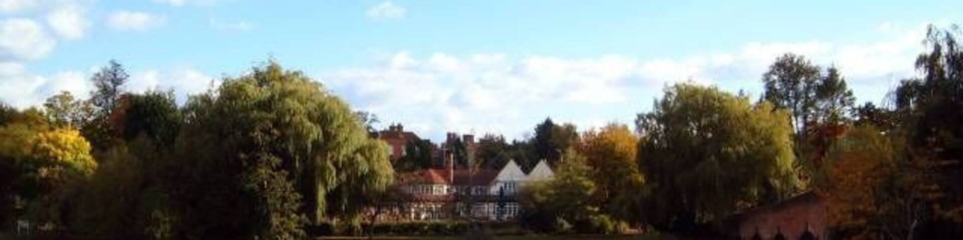 Landscape around Sonning Bridge. An autumn view across the River Thames overlooking Sonning Bridge.