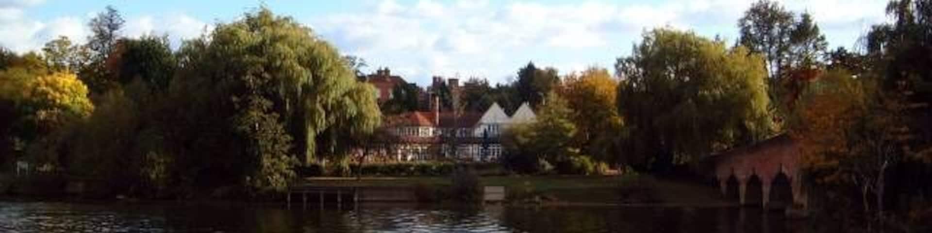 Landscape around Sonning Bridge. An autumn view across the River Thames overlooking Sonning Bridge.