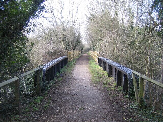 Redbourn: The Nicky Line. The trackbed of the dismantled Hemel Hempstead to Harpenden railway line, known as the Nicky Line, viewed looking westwards over the bridge over the old A5 road, Redbourn High Street. The railway was built in 1877, but passenger trains ceased in 1947, and the track was finally lifted in 1979. The trackbed now forms part of National Cycle Network Route 57. More information is available from the Wikipedia link here Nicky_Line