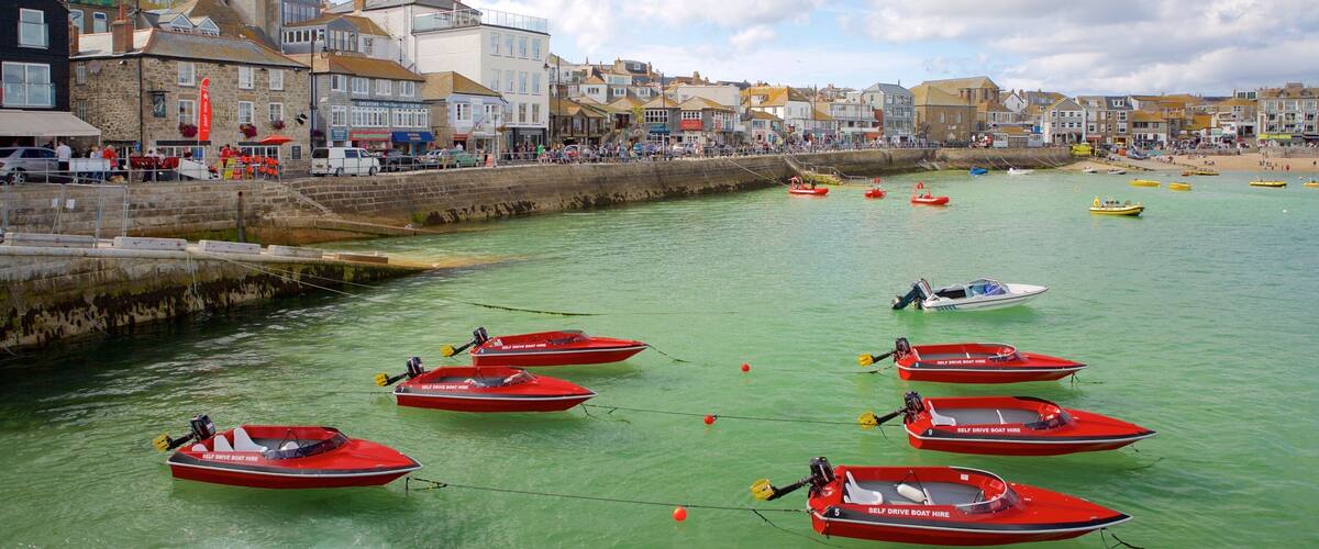 St Ives showing boating, a coastal town and rocky coastline
