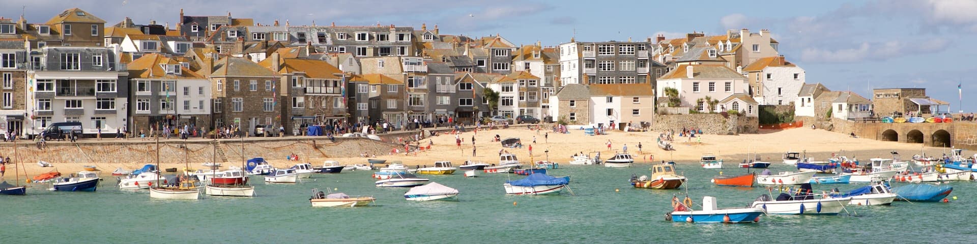 St. Ives che include giro in barca, località costiera e spiaggia sabbiosa