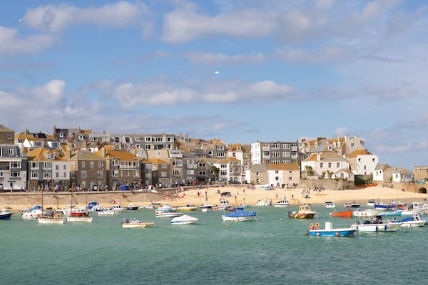 St Ives featuring a sandy beach, a coastal town and a bay or harbour