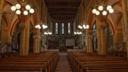 Built in 1864 by J. L. Pearson for a cost of £11,000, it is built of brick with stone dressings. There is an eastern apse with no chancel arch and small transepts. Originally a tower was planned at the south west corner, apart from the base, it was never built, but there is a leaded flèche on top of the church. This is still quite prominent as the church is built on a slope with the vestries beneath the chancel.