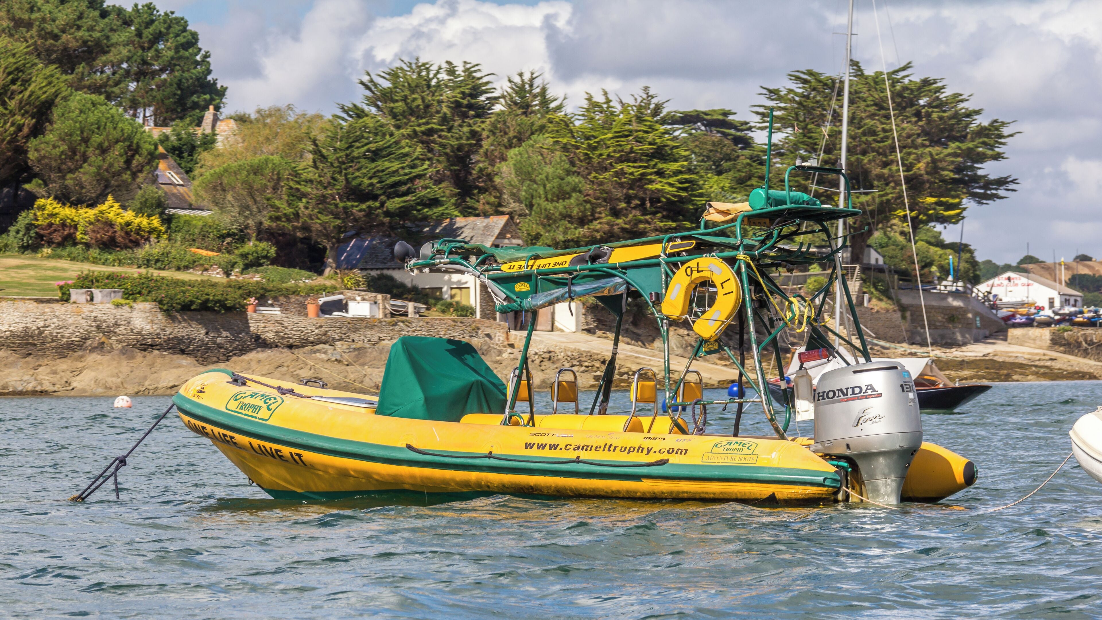 Inflatable boat of the Camel Trophy in harbour of St Mawes, Cornwall