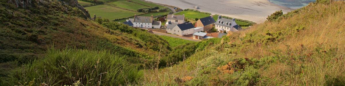 St Ouen which includes landscape views, general coastal views and a coastal town