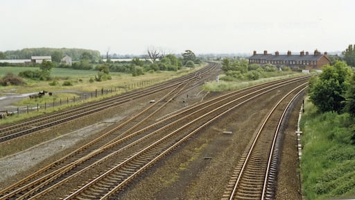 Main lines running south from Church Fenton. View southward from bridge at the south end of Church Fenton station: ex-NER major junction of main lines from York, and from Harrogate via Wetherby, to Sheffield via Pontefract (to the left) and to Leeds (to the right).