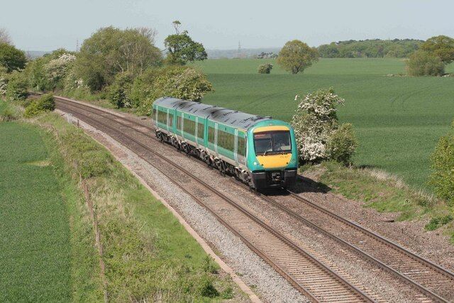 Southbound passenger train Heading away towards Tamworth this train is bound for Cardiff via Birmingham/