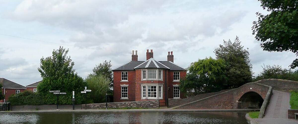 Fazeley Junction and Tollhouse, Staffordshire This shows the junction where the Birmingham and Fazeley Canal meets the Coventry Canal. Here the Coventry Canal goes to the right through Tamworth, Atherstone, Nuneaton, Bedworth to Coventry, 27 miles. The Birmingham and Fazeley Canal (completed in 1789) continues to the left along a course that the Coventry Canal Company planned but failed to build due to financial problems. This meets the Trent and Mersey Canal eleven miles away at Fradley Junction.