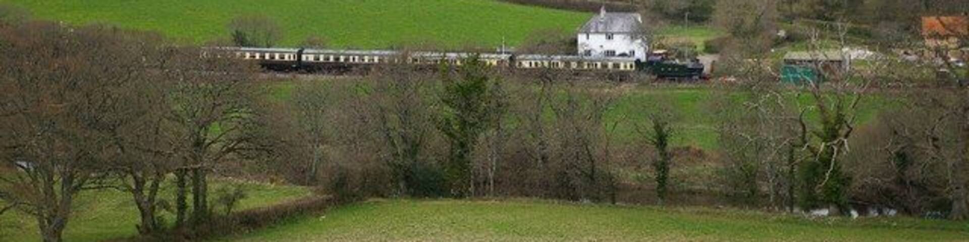 Train approaching Staverton. A GWR Prairie headed train approaching Staverton from Buckfastleigh.