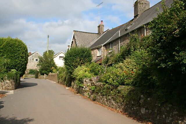 Ashprington Village Going uphill towards the village centre on the road from Bow Bridge.