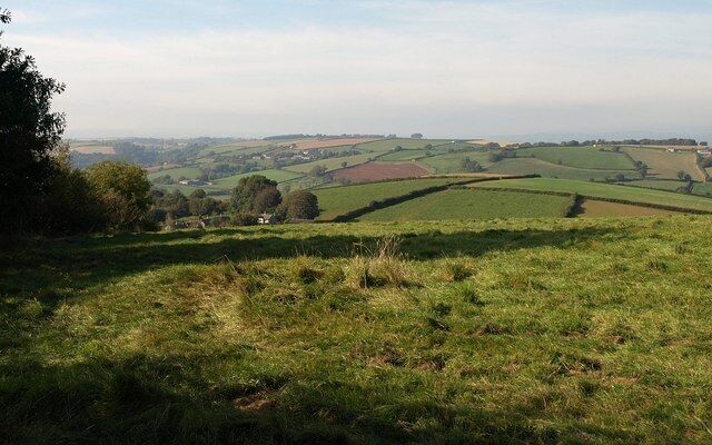 Field near Cornworthy A view from Longland Cross towards Bow Creek. The distant village left of centre is Ashprington.
