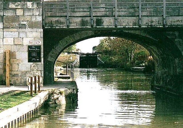 Semington Bridge - No.160 - K&A Canal In the background is Lock No.15, Buckley's Lock, the bottom of the Semington pair. Locks on the Kennet & Avon Canal are numbered from the west, Hanham Lock on the River Avon being No.1, while bridges are numbered from the east.